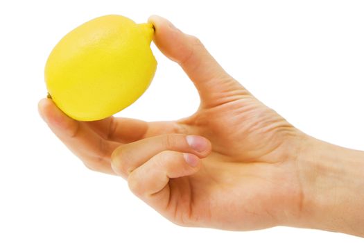 yellow lemon in male hands on a white background
