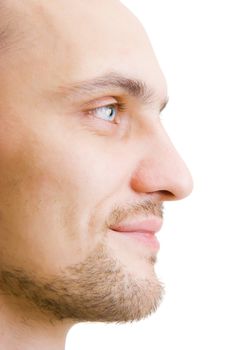 happy face unshaven young man in profile on a white background
