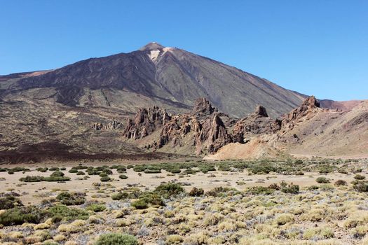 The conical volcano Mount Teide or El Teide in Tenerife is Spains highest mountain. It has featured as the location of many hollywood films and is the premier tourist attraction in the Canary islands 