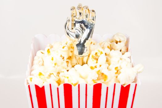 Picture of a iron hand in some popcorn