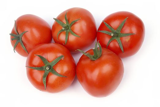 Group of red tomatos isolated on white background
