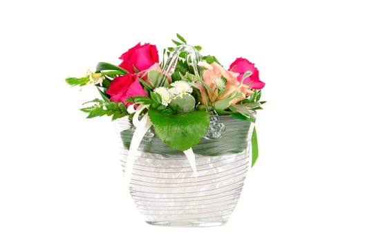 Bunch of roses in a vase isolated on white background