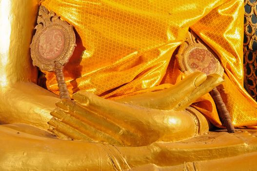 hand of golden buddha statue