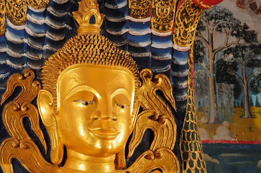 face of golden buddha statue