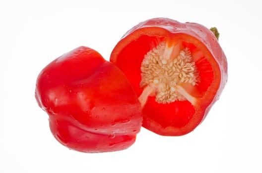 Red pepper close up isolated on white background.