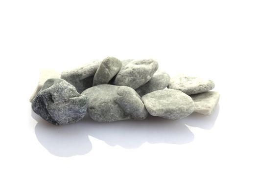 pebbles showing spa or zen stone garden concept isolated on white