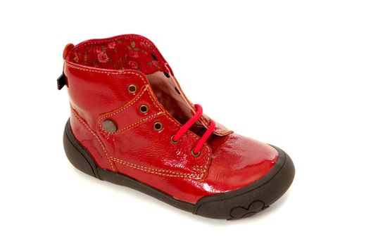 A red shoe. Taken on a clean white background.