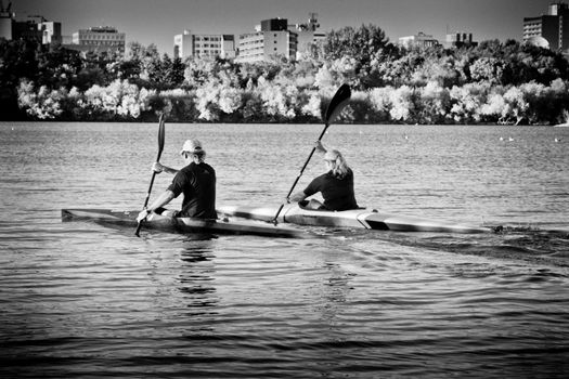 Paddling in a canoe on Wascana Lake in Regina, Canada