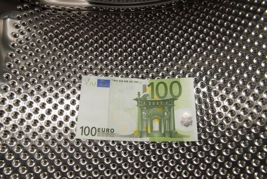 Euro bills in the lattice drumhead,of Washing Machine.