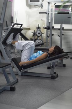 Woman practices and resting in Gym