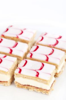 Tompouce, a common pastry in the Netherlands and Belgium.  Here with red and white icing, not the traditional pink.