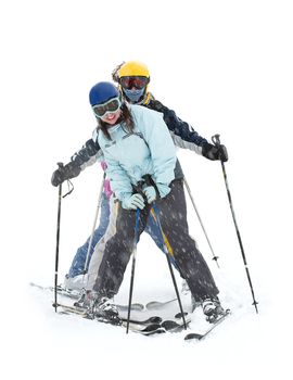 A group of happy skiers in heavy snowfall