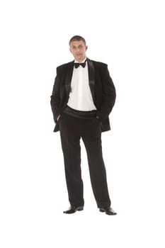 The charming imposing man tries on a new classical tuxedo for solemn ceremony