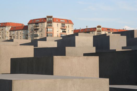 Holocaust monument with residential buildings in Berlin, Germany