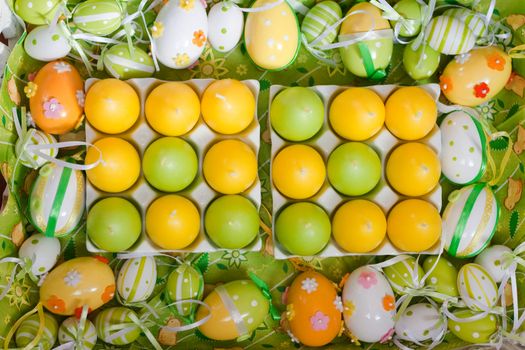 Background easter egg decoration in green, yellow and white