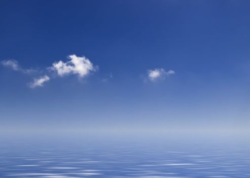 Clouds over a deep blue sky reflected in the ocean