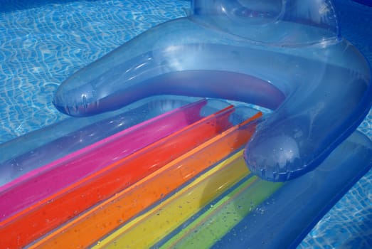 An airbed in a swimming-pool.