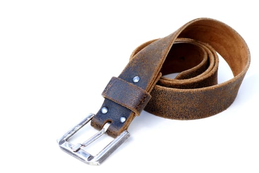 An isolated leather brown belt.