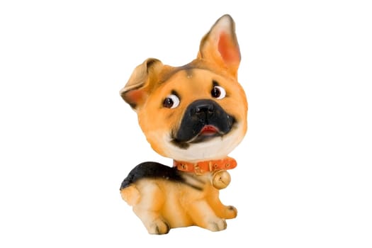 a small plastic toy doggie isolated on the white background