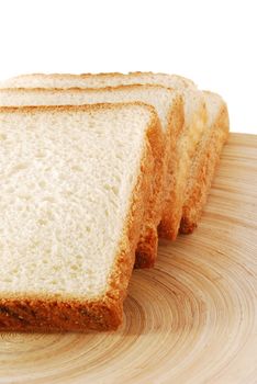 bread slices in wooden bowl