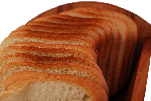 bread slices in wooden bowl