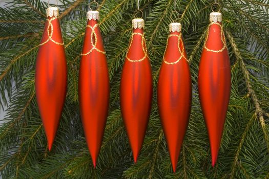 a row of christmas ornaments - seasonal decoration - close up