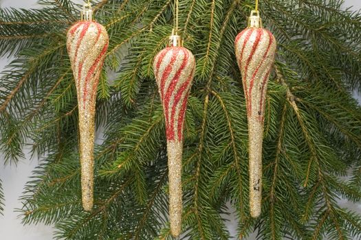 three christmas ornaments - seasonal decoration - close up