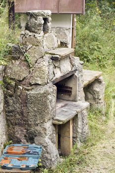 grill, chimney and fireplace used for barbecues