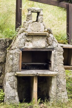 grill, chimney and fireplace used for barbecues