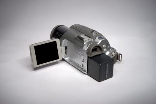A silver digital video camera - close up