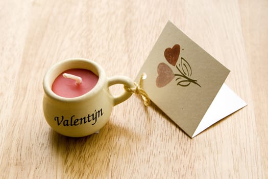 Valentine Candle with a greeting-card - close-up