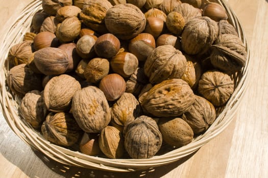 A close-up of a basket of various nuts.