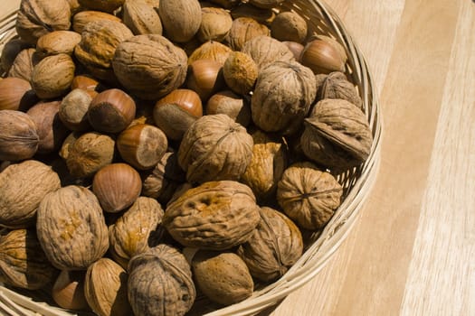 A close-up of a basket of various nuts.