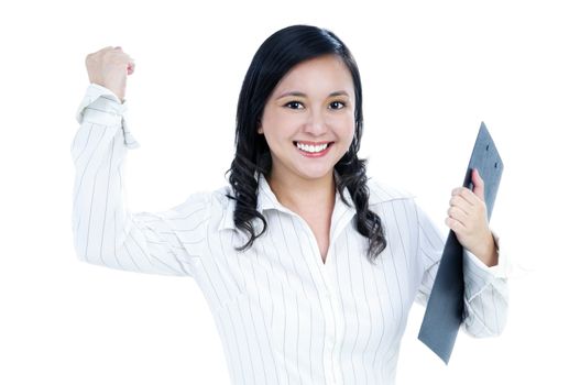 Portrait of a beautiful businesswoman holding clipboard and clenching her fist, isolated on white.