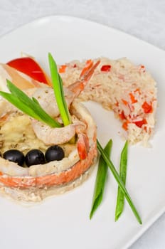 tasty prepared fish with rice and vegetables