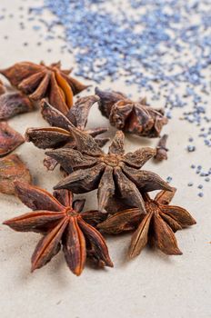 Anise stars close-up on a brown background