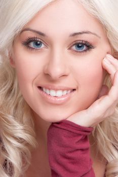 Beautiful smiling blond woman face