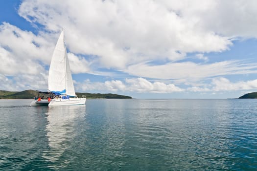 Luxury white catamaran boat in the bay