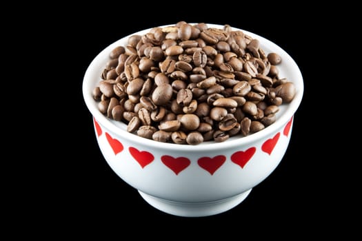Picture of some coffee beans in a white heart yar