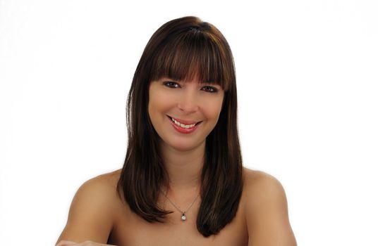 A close-up of a lovely young brunette with a captivating smile.