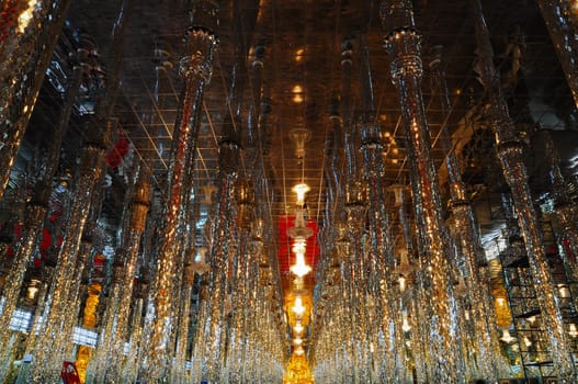 Golden Buddha statue at Cathedral glass, Temple in Thailand