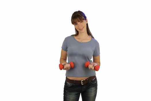 A lovely young brunette wearing casual attire, holds a pair of hand weights.