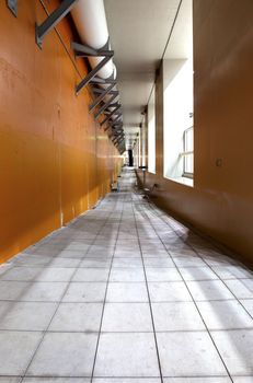 A long hallway underneath the waterline at the Bonneville dam, OR.