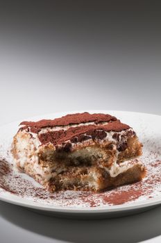 Classic, traditional tiramisu fresh cake from Italian tradition