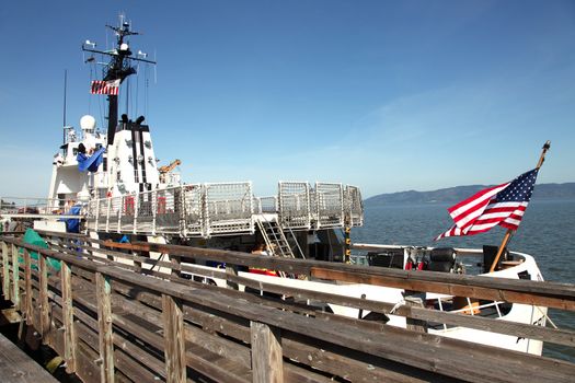 A coast guard ship anchored for the service in Astoria Oregon.