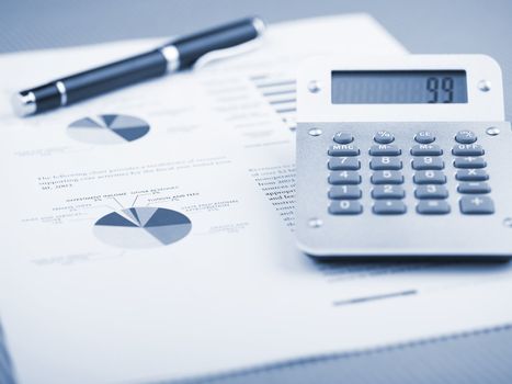 Market Analyze - pen and calculator on papers