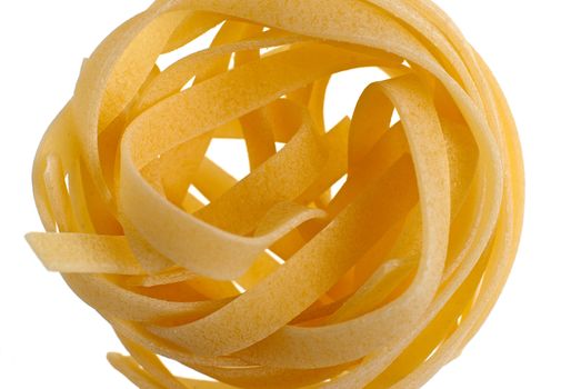 Italian pasta tagliatelle selective focus macro detail isolated on white background.