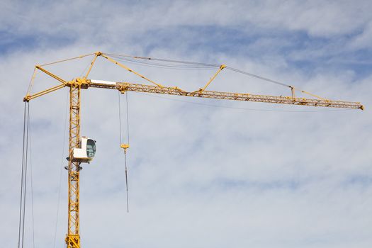 Construction Crane on cloudscaped sky