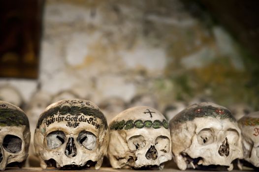 Painted Skulls in a Bone House in Austria