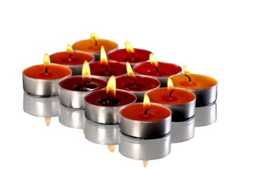 colored candles on white background